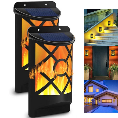 Two black solar wall lights with flame effects and decorative cutouts, shown installed outdoors.