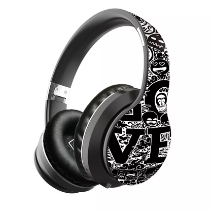 Black headphones with white graphic patterns and text on the band, featuring padded ear cushions.