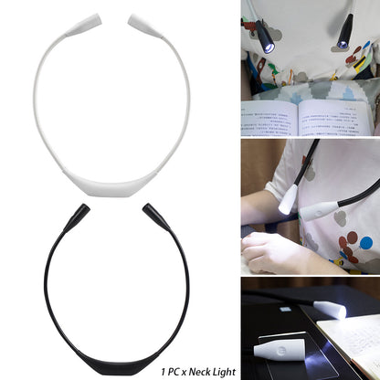 Flexible neck light in black and white, worn while reading, illuminating pages and keyboard.