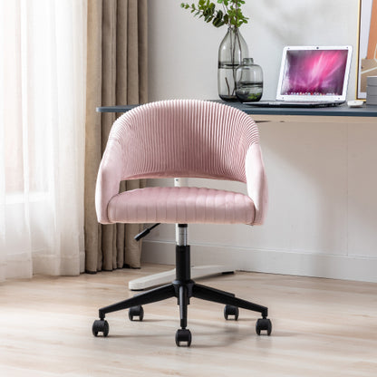 Pink ribbed office chair on wheels in a bright room, near a desk with a laptop and vase.