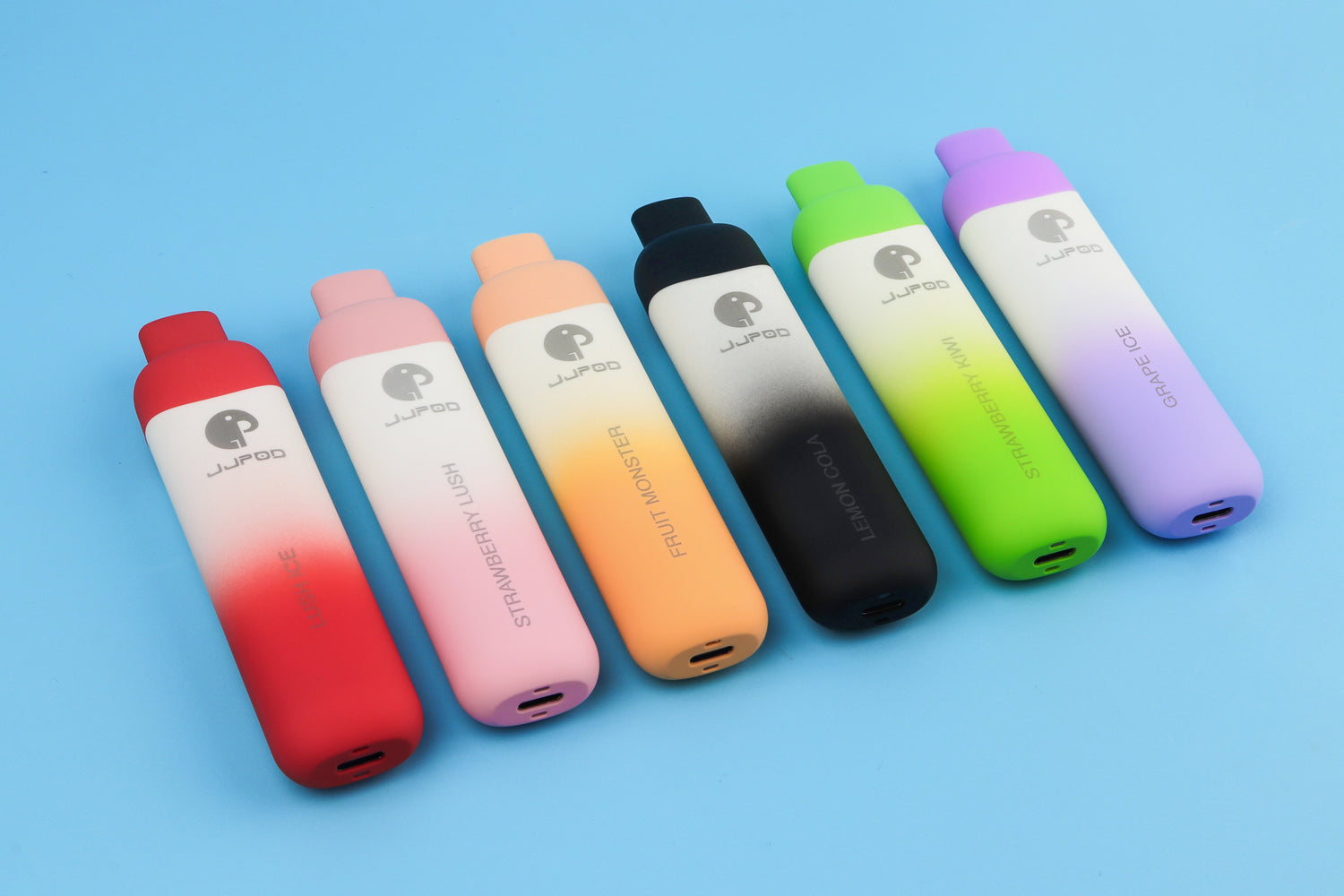 Seven colorful vaping devices on a blue background: red, pink, orange, black, green, purple.