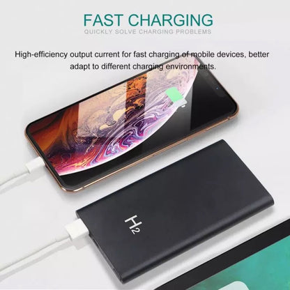 Phone charging via black H2 power bank, colorful screen, with "Fast Charging" text above.
