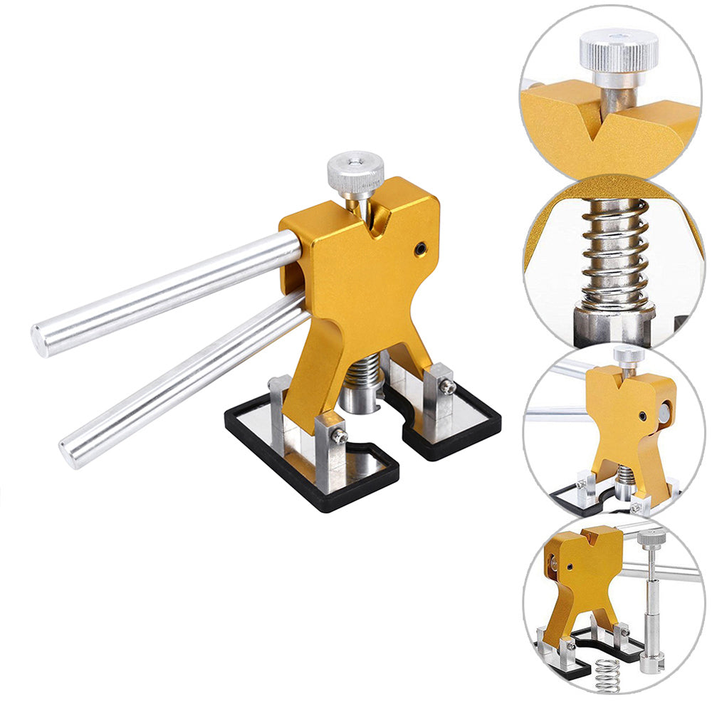 Gold paintless dent repair tool with silver handles and base; features detailed in circular insets.
