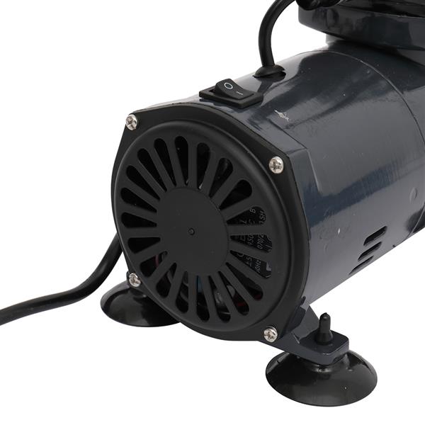 Dark gray cylindrical motor with a vented front, power switch, and suction cup feet on a white background.