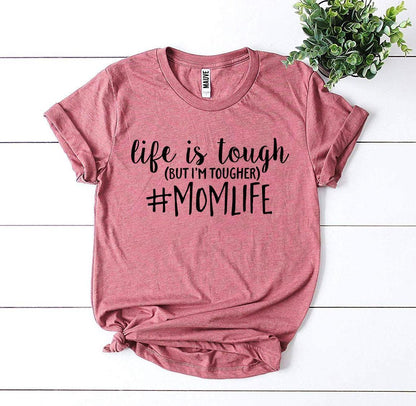 Pink T-shirt with black text "Life is tough (but I&