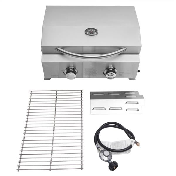 Silver tabletop gas grill with two knobs, a thermometer, a grill grate, drip tray, and a hose.