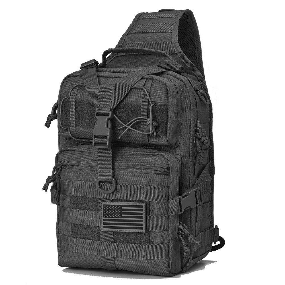 Black tactical backpack with multiple zippered compartments and an American flag patch.