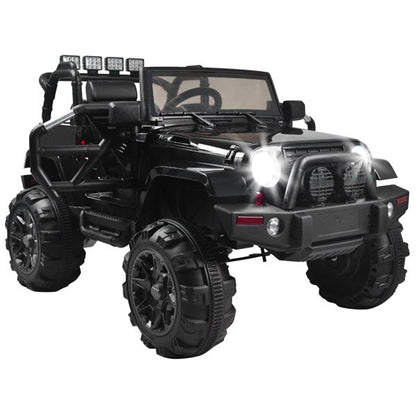 Black toy jeep with large rugged wheels, lit headlights, and a roll cage design.