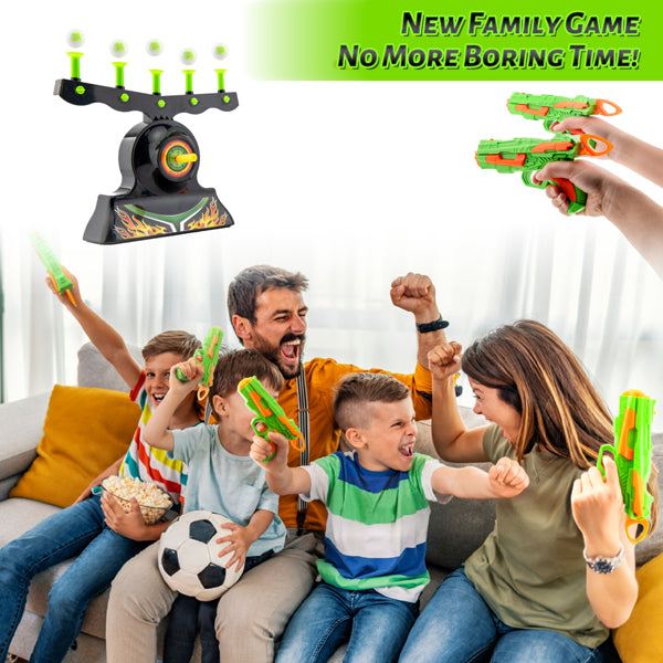 Family on a sofa joyfully playing with green toy guns, next to a target and game title in green text.