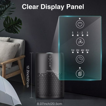 Black air purifier with touch panel and icons, next to a gray chair and potted plant.