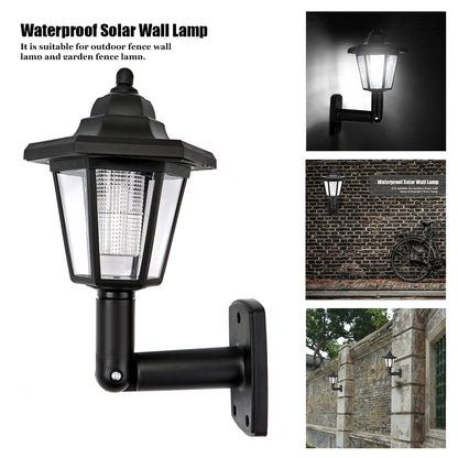 Black solar wall lamp with clear panels on a textured wall; shown in daylight and nighttime settings.