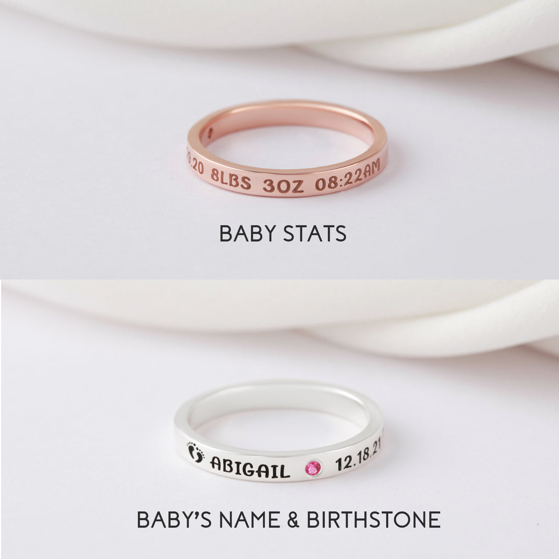 Rose gold ring with stats engraving, silver ring with name, pink gem, and footprints design.