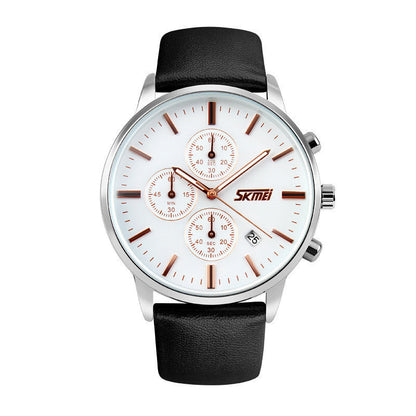 White dial watch with rose gold markers, black leather band, and three subdials.