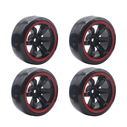 Four black wheels with red rims, featuring five spokes each, arranged in a grid pattern.
