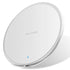 White circular wireless charger with "FAST CHARGE" text and a blue indicator light.