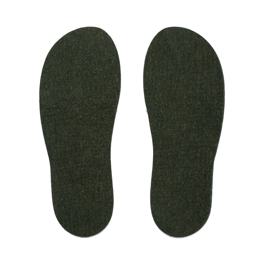 Dark green felt shoe insoles on a white background.