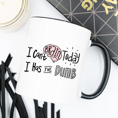 White mug with black handle, illustrated brain and text: "I Can&