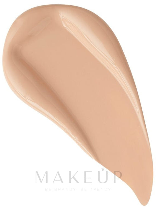 Smooth beige makeup swatch with glossy texture on a white background, slightly curved shape.