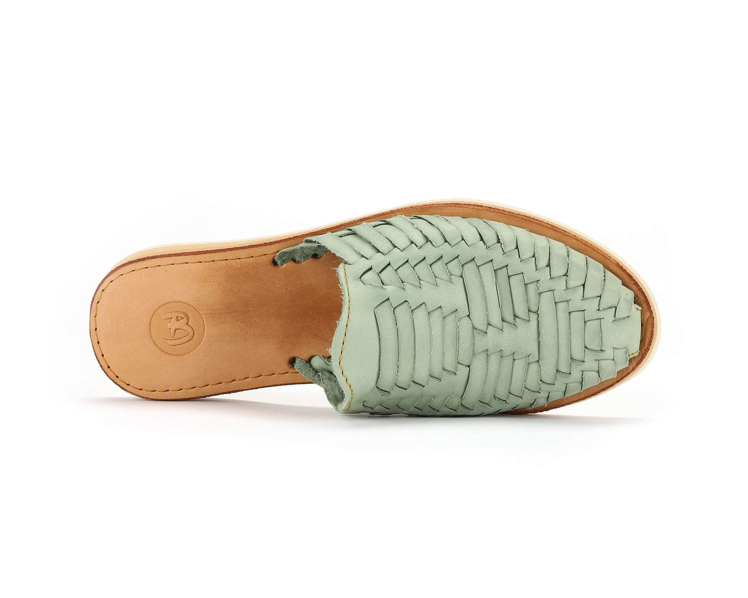 Light green woven sandal with a tan leather sole and open back, viewed from above.