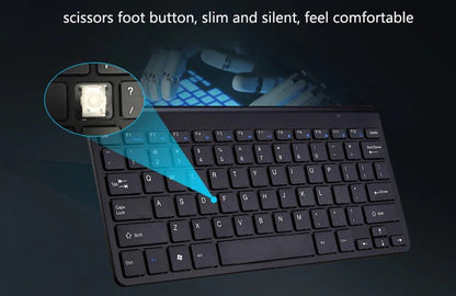 A black keyboard with scissors foot mechanism highlighted; blue and black background.