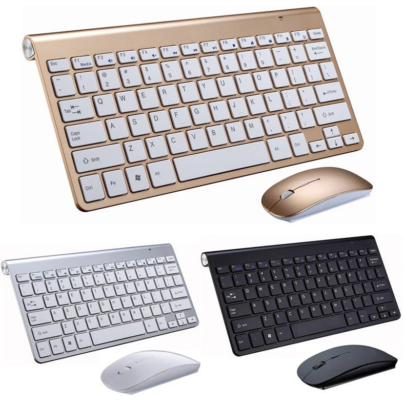 Three sleek wireless keyboard and mouse sets in gold, silver, and black.