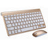 Gold wireless keyboard with white keys and matching mouse on a white background.