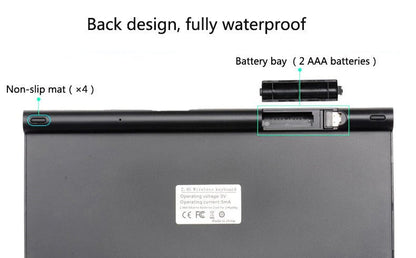 Black keyboard back with a battery bay for 2 AAA batteries and non-slip mats, labeled waterproof.