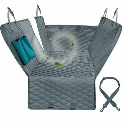 Gray quilted car seat cover with side flaps, teal pocket, and adjustable strap; green leaves added.