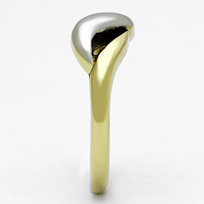 Gold ring with a smooth, curved design and a white metallic accent on top, against a white background.